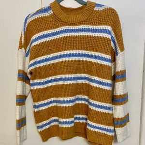 Orangish-brown/white/blue striped sweater. Medium.